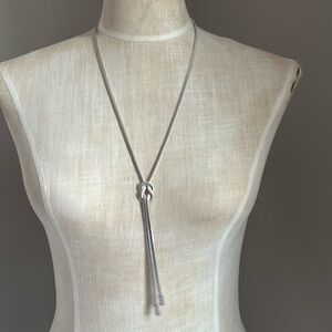 Kenneth Cole knot silver pendant